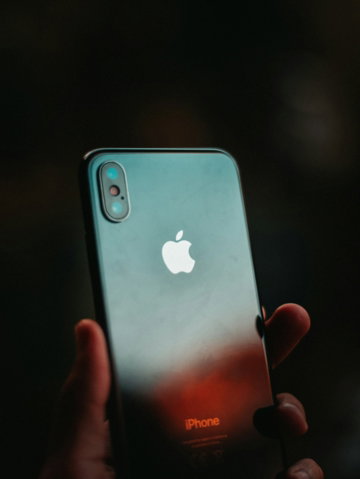 post-2018-i-phone-in-person-s-hand.jpg post-2018 iPhone in person's hand